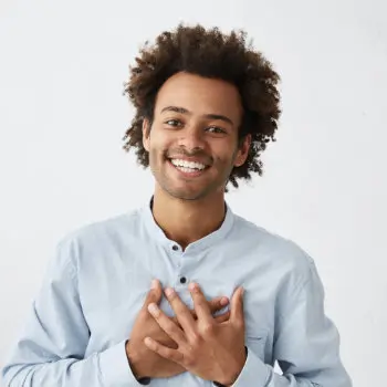 cheerful smiling young african american man